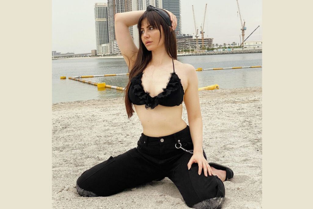 Actress Giorgia Andirani looks sultry in a black bikini bralette paired with black joggers.